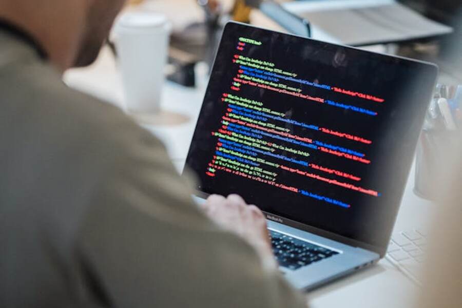 Poor posture at laptop leading to tension headaches — High Amplitude Health San Mateo