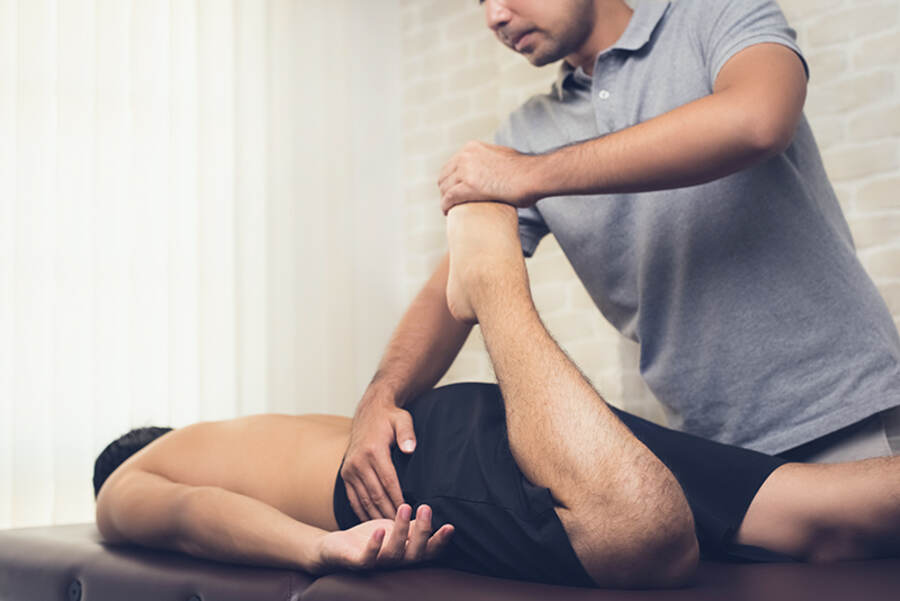 Myofascial therapy with massage gun at High Amplitude Health San Mateo